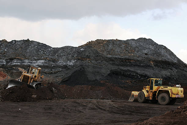 Bulldozers working at the slag heap